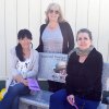 Friends of longtime Stratford teacher Gina Weins, at the site of a bench dedicated in honor of the fourth-grade teacher.